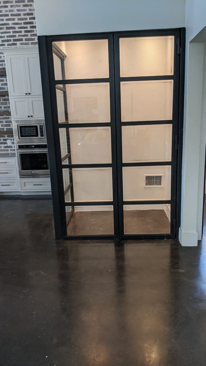 Custom glass shower enclosure with frameless design installed by Door Pro Plus